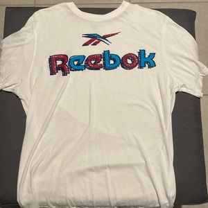 medium sized men’s white T-shirt